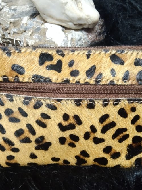 IMG_20250529_175921 MONEDERO LEOPARDO