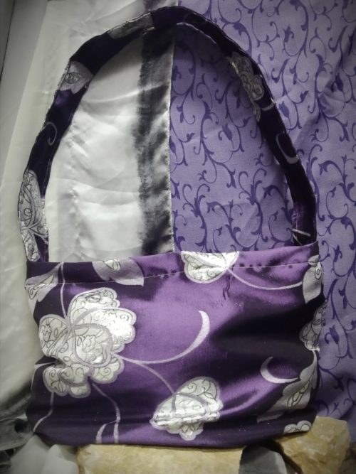 IMG_20250626_181224 BOLSO MORADO metalizado